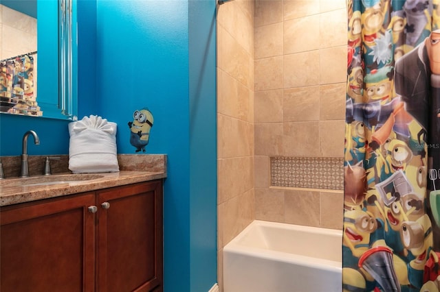 bathroom with shower / tub combo with curtain and vanity