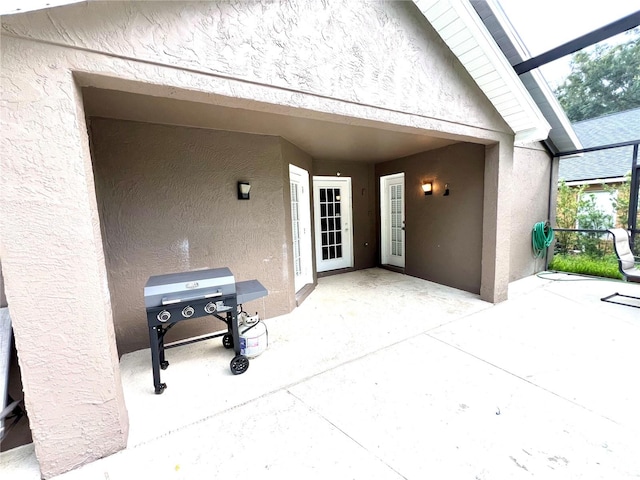 view of patio / terrace with a lanai