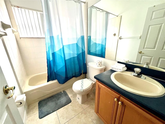 full bathroom with shower / bath combination with curtain, vanity, toilet, and tile patterned floors