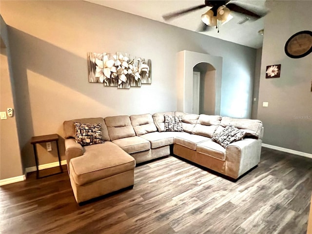 living room featuring ceiling fan and hardwood / wood-style floors