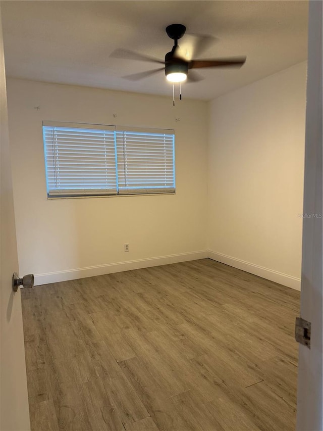 2070 World Parkway Blvd Unit 50, Clearwater, FL 33763 - spare room featuring a ceiling fan and wood finished floors