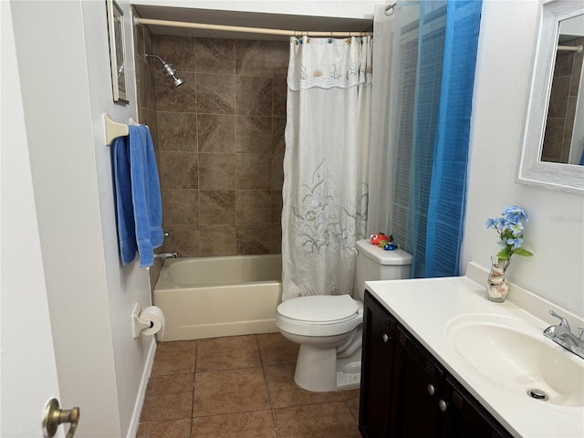 full bathroom featuring tile patterned floors, toilet, shower / tub combo, and vanity