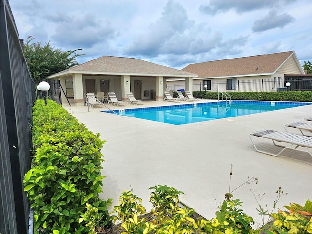 view of pool featuring a patio