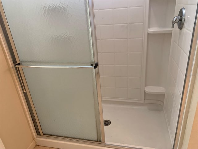 bathroom with an enclosed shower