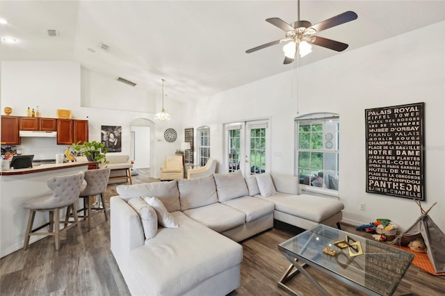 living room with french doors, high vaulted ceiling, dark hardwood / wood-style floors, and ceiling fan