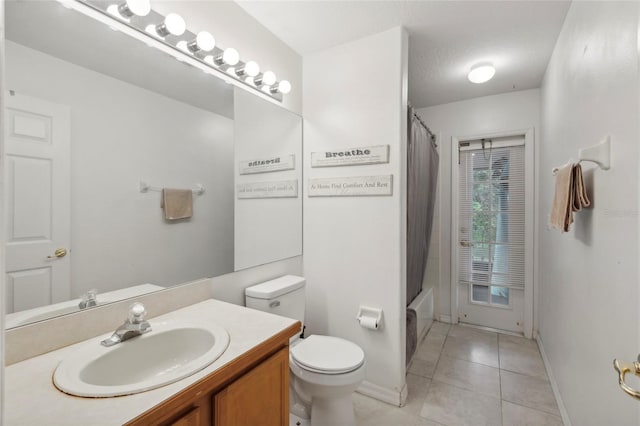 full bathroom with shower / bath combo, toilet, tile patterned flooring, a textured ceiling, and vanity