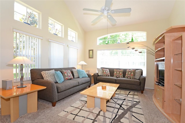 living room featuring light carpet, ceiling fan, and high vaulted ceiling