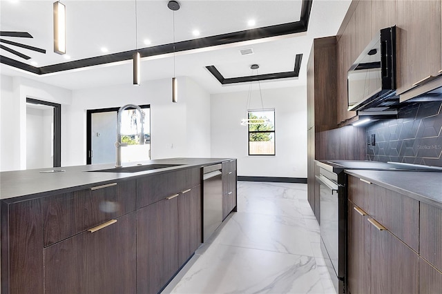 kitchen featuring pendant lighting, a tray ceiling, dishwasher, and electric range