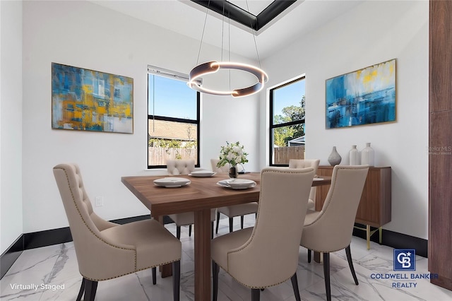 dining room featuring plenty of natural light