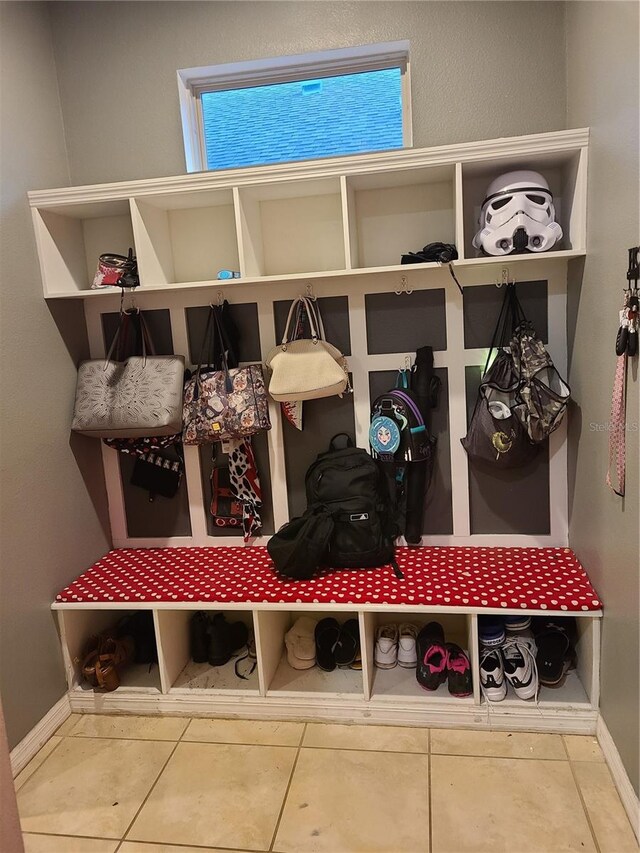 mudroom with tile patterned floors