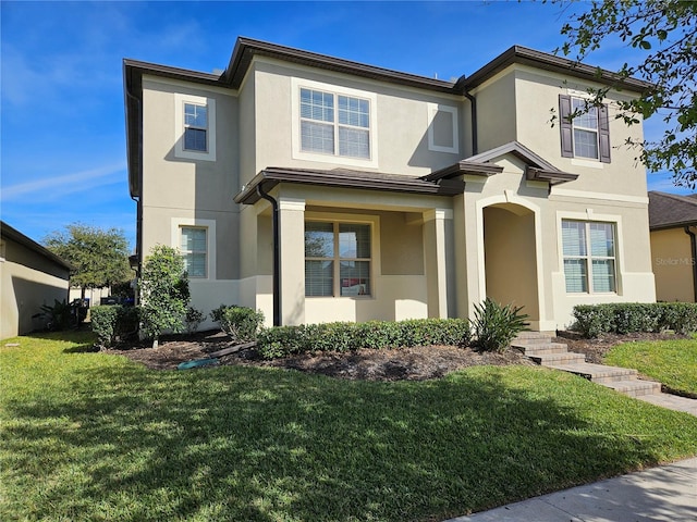 view of front of property with a front lawn