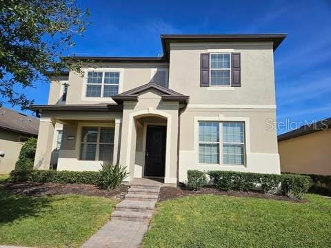 view of front facade with a front yard