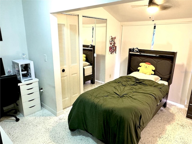 bedroom with multiple closets and ceiling fan