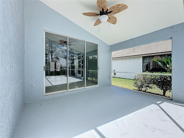 exterior space featuring ceiling fan