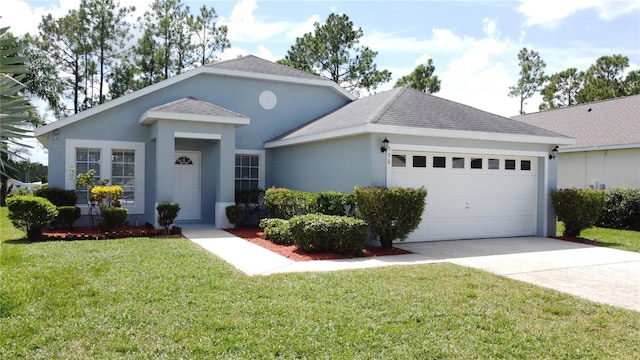 ranch-style home featuring a garage and a front lawn