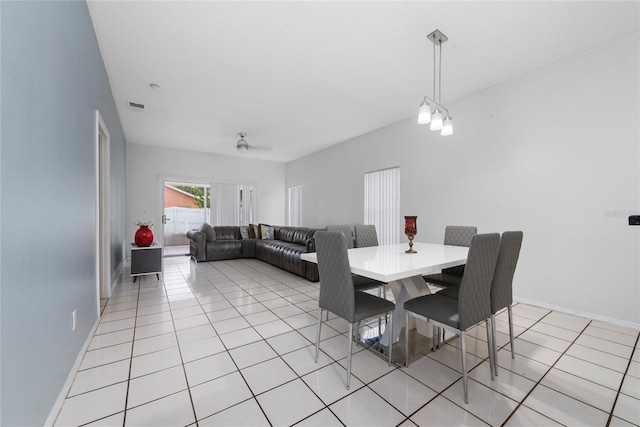 dining area with light tile patterned floors