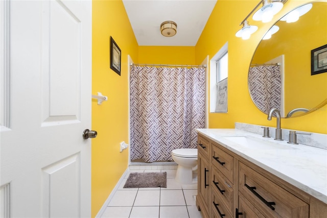 bathroom with vanity, curtained shower, tile patterned floors, and toilet