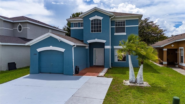 front facade featuring a garage and a front yard