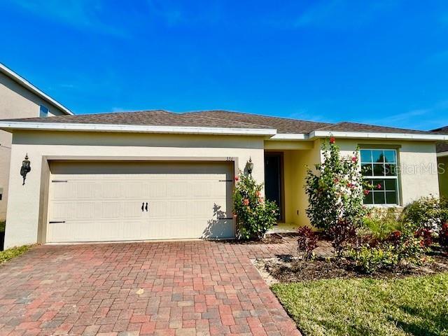 ranch-style house with a garage