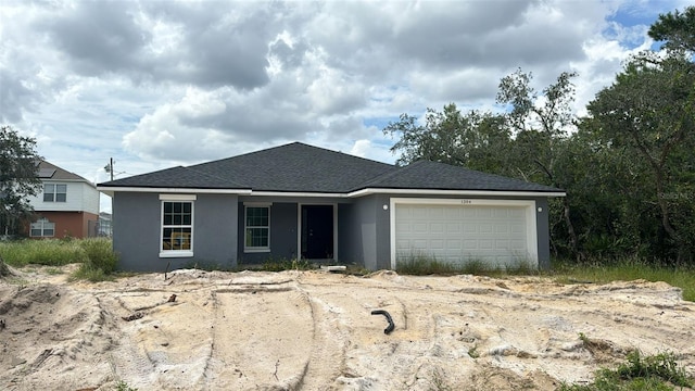 view of front of house with a garage