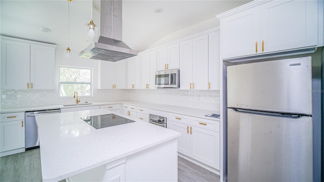 kitchen with a center island, island range hood, stainless steel appliances, and white cabinets