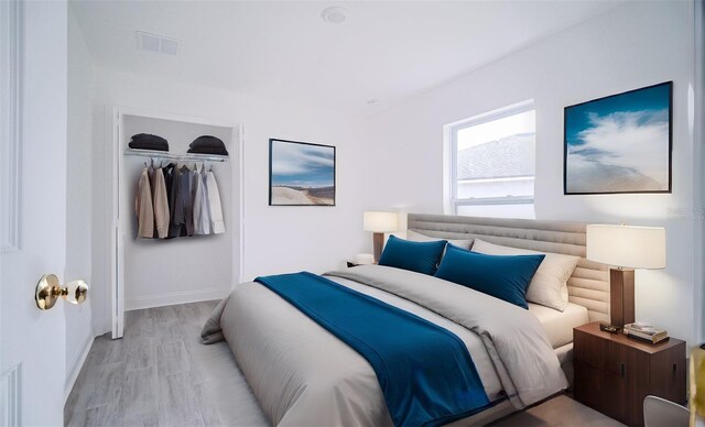 bedroom featuring a closet and light hardwood / wood-style floors