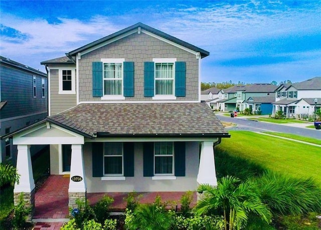 view of front facade with a front yard