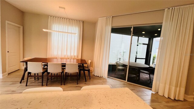 dining area featuring light hardwood / wood-style floors