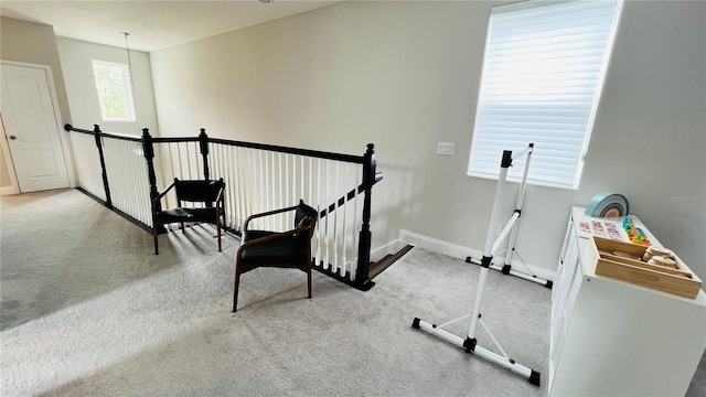 13706 Werrington Dr, Winter Garden, FL 34787 - sitting room featuring carpet floors, an upstairs landing, and baseboards