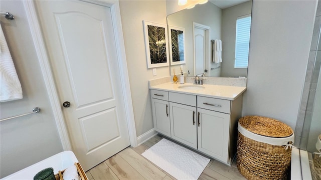 13706 Werrington Dr, Winter Garden, FL 34787 - bathroom featuring wood finished floors and vanity