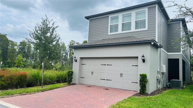13706 Werrington Dr, Winter Garden, FL 34787 - exterior space featuring decorative driveway and central air condition unit