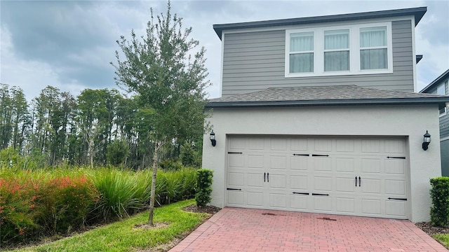 13706 Werrington Dr, Winter Garden, FL 34787 - garage with decorative driveway