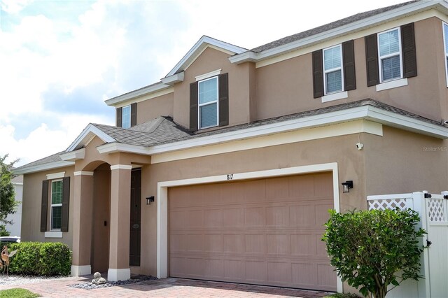 view of front of home with a garage