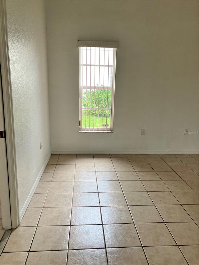 view of tiled empty room