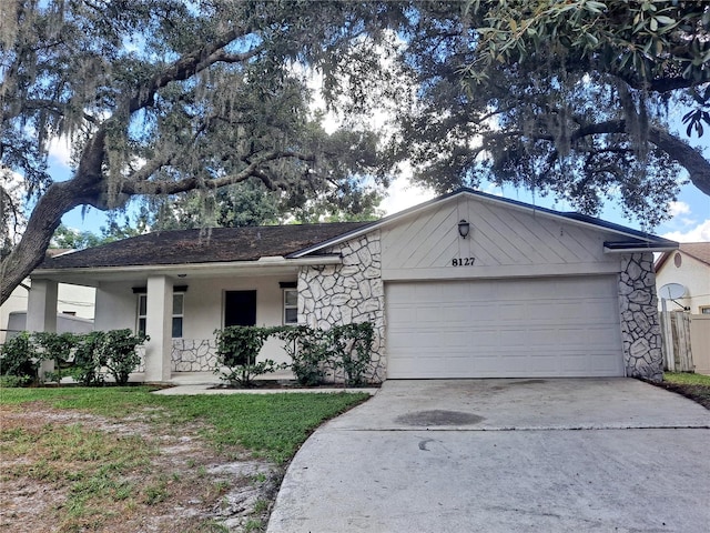 single story home featuring a garage