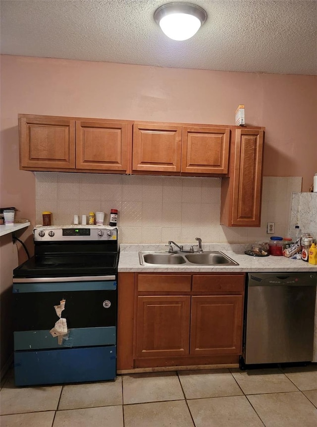 kitchen with backsplash, dishwasher, black range with electric stovetop, and sink