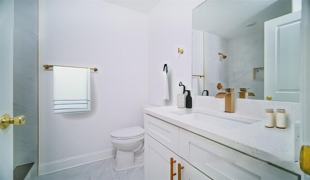 bathroom with a shower, toilet, a textured ceiling, and vanity