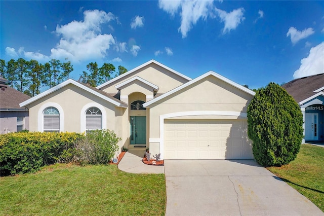 ranch-style house featuring a front yard and a garage