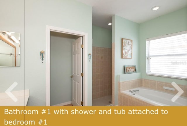 bathroom with shower with separate bathtub