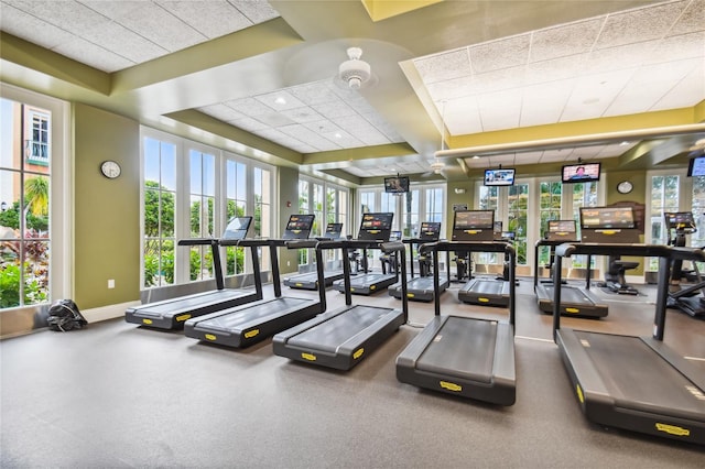 workout area featuring a paneled ceiling