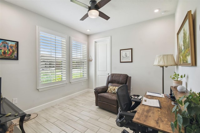 office area featuring ceiling fan and light wood-type flooring