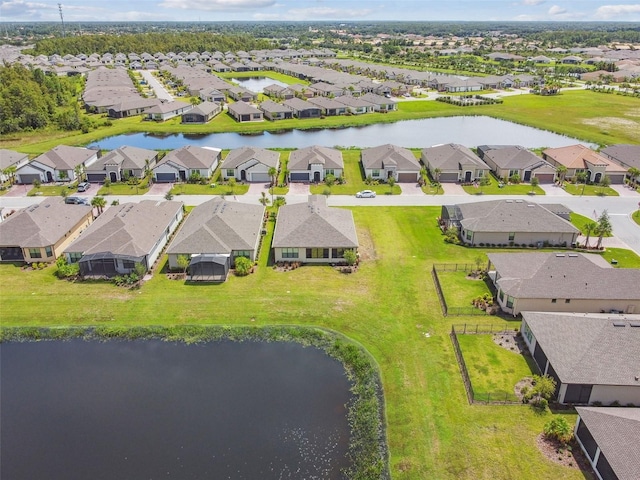 drone / aerial view with a water view