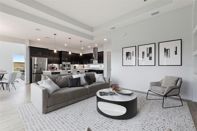 living room with light hardwood / wood-style floors