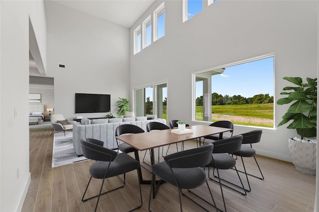 dining area with light wood-type flooring