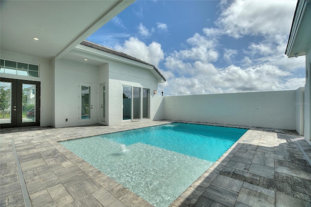 107 Hampton Loop, Davenport, FL 33837 - view of pool with french doors and a patio area