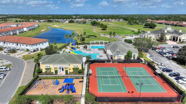 107 Hampton Loop, Davenport, FL 33837 - bird's eye view of a nearby body of water, a golf course, and a pool