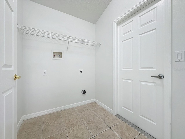 washroom featuring light tile patterned floors, baseboards, laundry area, electric dryer hookup, and washer hookup