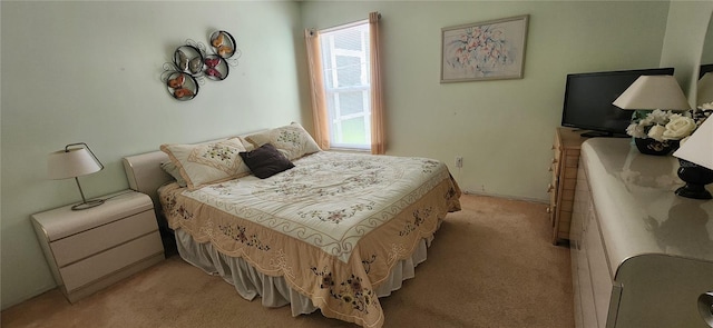 bedroom with light colored carpet