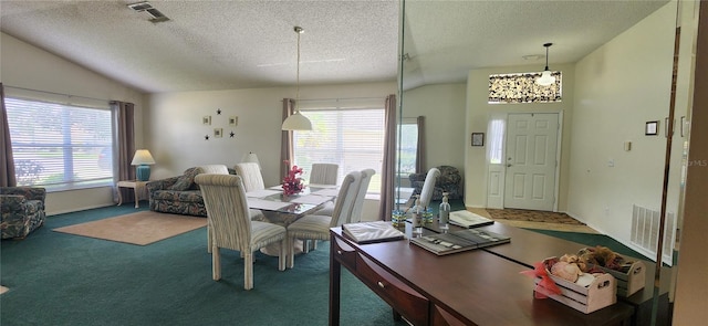 carpeted dining space featuring a textured ceiling, an inviting chandelier, and lofted ceiling