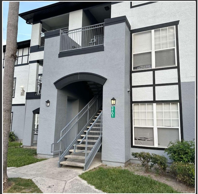 3701 Castle Pines Ln Unit 3914, Orlando, FL 32839 - view of building exterior with stairway
